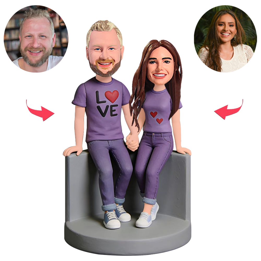 A Couple in Purple Outfits Sitting Custom Bobbleheads